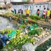 Polsek Krian Berkolaborasi dengan Sungai Watch Gelar Aksi Bersih Sungai di Desa Ponokawan